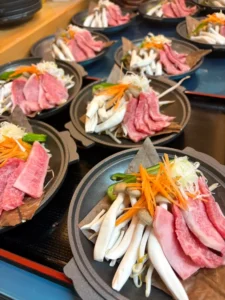 団体料理イメージ（飛騨牛カルビ陶板焼御膳）